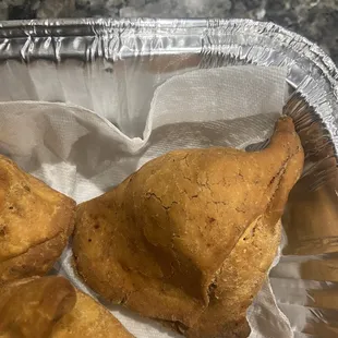 Bad oil used to fry samosa. Leaves a bitter aftertaste in the mouth after eating it.