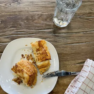 a plate of food and a glass of water