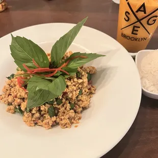 Northern Thai Basil Chicken and comes with side of white rice (similar to gra pow - it was delicious!)
