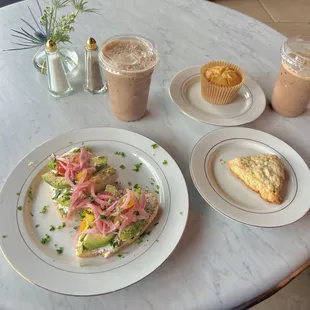 Avocado toast, honey lavender scone, lemon poppy seed muffin, iced mochas