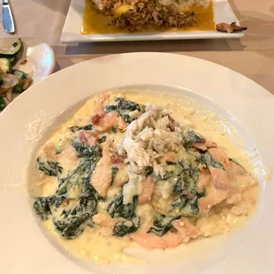 pistachio crusted salmon &amp; smoked salmon fettuccine w/ risotto. (Took this pic after we had already started eating)