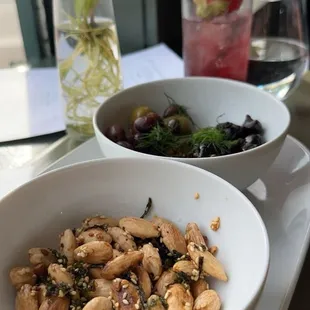 Mixed olives and warm nuts