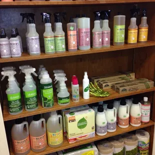 a shelf full of cleaning products