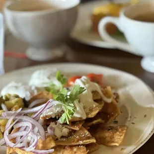 Best Chilaquiles ever! Added the poached eggs