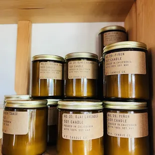 a shelf full of candles