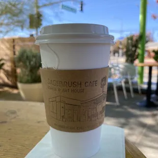 a cup of coffee on a table