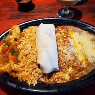 #4 with chile releno, rice, beef burrito, chicken enchilada , and refried beans. It was enough for two meals.