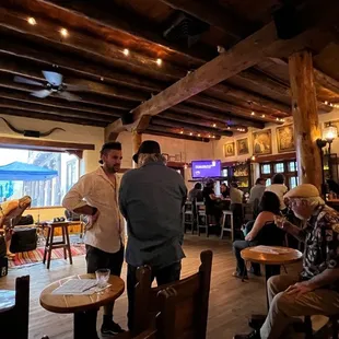a group of people sitting at tables