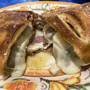 Italian Sausage, Canadian Bacon, Black Olive and Mushroom Calzone