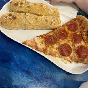 Pepperoni pizza and breadsticks