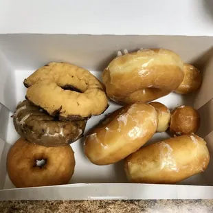 Donuts placed carelessly in box :-/