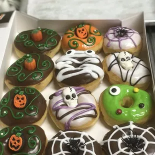 a box of decorated donuts