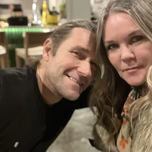 Bar in background, but mostly a selfie. Sorry it was the only photo we took.