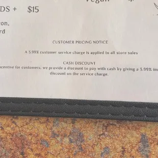 3.99% charge per person unless you pay with cash