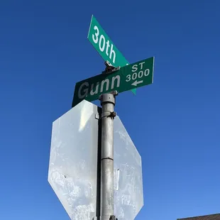 a stop sign and street sign