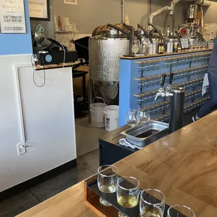 Behind the counter in taproom.  Bigger tulips for members only.