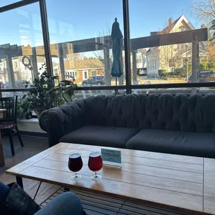 Cozy lounge area up front looking out at downtown Grafton.