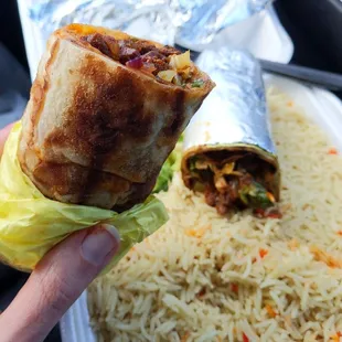 Delicious beef wrap with a side of rice.