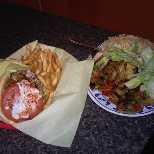 Delcious chicken and veggies with rice. And a goat beef gyro. #very Delcious