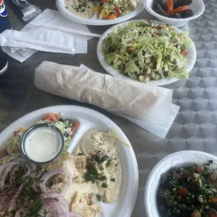 31. Chicken Shawarma Over Rice Plate 36. Sahara Chicken Over Rice Plate 18. Stuffed Grape Leaves 11. Side of Tabooli 13. Cucumber Salad