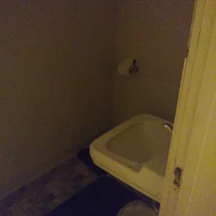 The 4.5 x 9 bathroom (toilet is next to the sink; shower is to the left, off-frame)