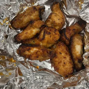 chicken wings wrapped in tin foil