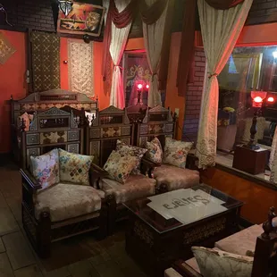 a living room with oriental decor