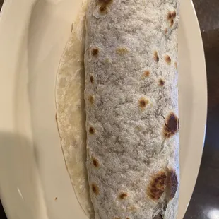 Asada burrito (ordered with rice addition for $1 so it might be smaller as a regular burrito)