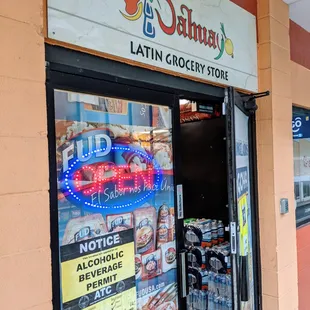 the entrance to a latin grocery store
