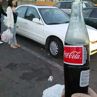 My drank and my princess and prince in the back ground