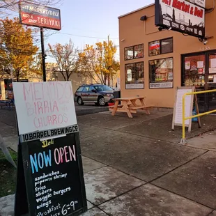 a sign on the sidewalk