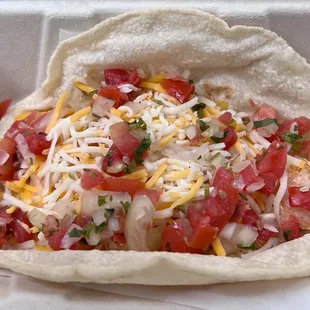 Shrimp on homemade tortilla; some awesome sauce that's hidden in photo