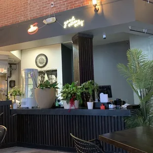 a restaurant with tables and chairs