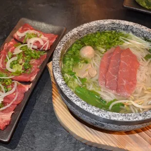 a bowl of beef and noodles