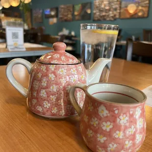 Cute teapot with hot green tea. So delish