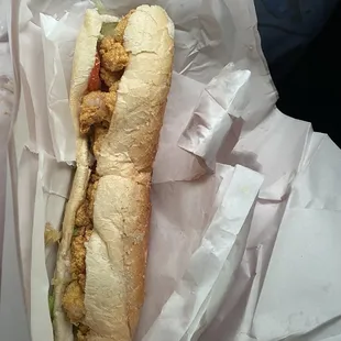 Small shrimp po-boy. So they say it&apos;s small but it was more than enough for one person. Hated to see the large one. Lol.