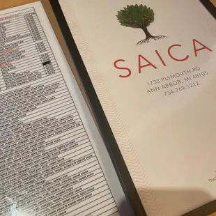 a menu and a picture of a tree