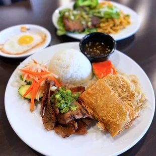 #34 Cơm Tấm Bì, Thịt Nướng, Tàu Hủ Ky, Chả: Broken Rice w/ shredded pork, bbq pork, fried shrimp cake, pork loaf | $13.95 + $2 egg