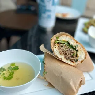 a sandwich and a bowl of soup