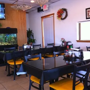 a restaurant with a fish tank