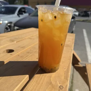 Peach passion fruit iced tea with less sweet