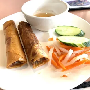 a plate of food and a bowl of soup