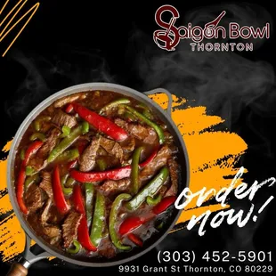 a pan of beef and peppers