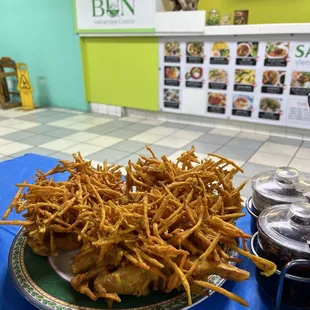 Banh co nhu (sweet potato &amp; prawn fritters) really huge portion with huge whole prawns and side of fresh lettuce herbs.