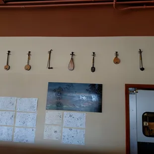 Unique music instruments adorn the East wall.