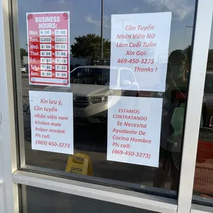 a sign in the window of a business