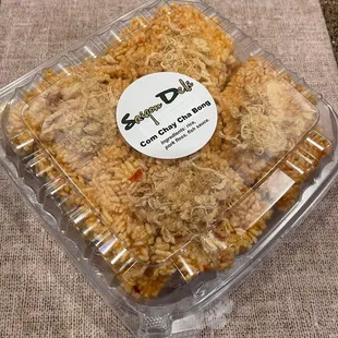 a container of rice and chicken