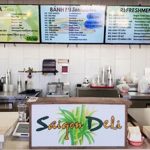 menus on the wall of the restaurant