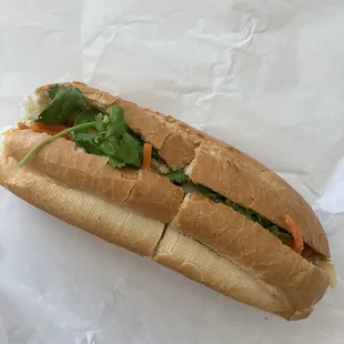 a sandwich on a piece of paper