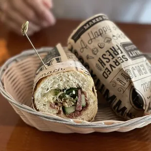 a sandwich in a basket on a table